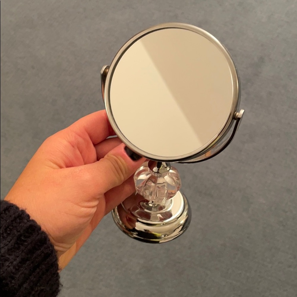 Mini magnifying mirror as accent piece